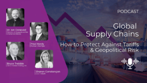 Container ship, cargo trucks, and aeroplane under a global map with a downward pink arrow, symbolising disruption in global supply chains.